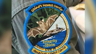 USS Gerald R Ford aviators counseled for wearing patch depicting bat as ‘China’s Newest Carrier'