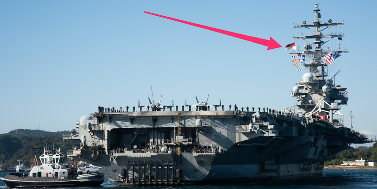 We salute the USS Ronald Reagan for rocking its battle flag on its way back to port