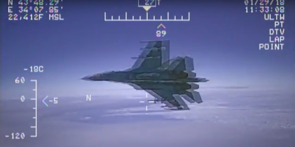 Insane Video Shows Russian Military Jet Flying Within 5 Feet Of US Navy Aircraft