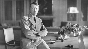 Hitler Sitting on Desk