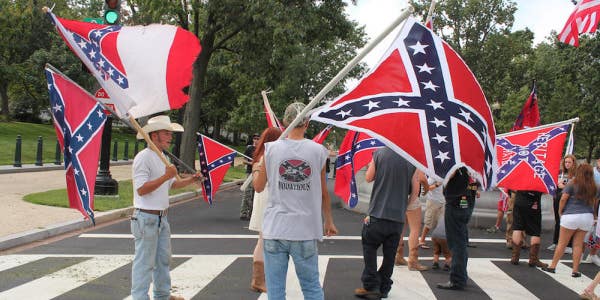 2 Marines Arrested After Flying White Nationalist Banner At A Confederate Rally
