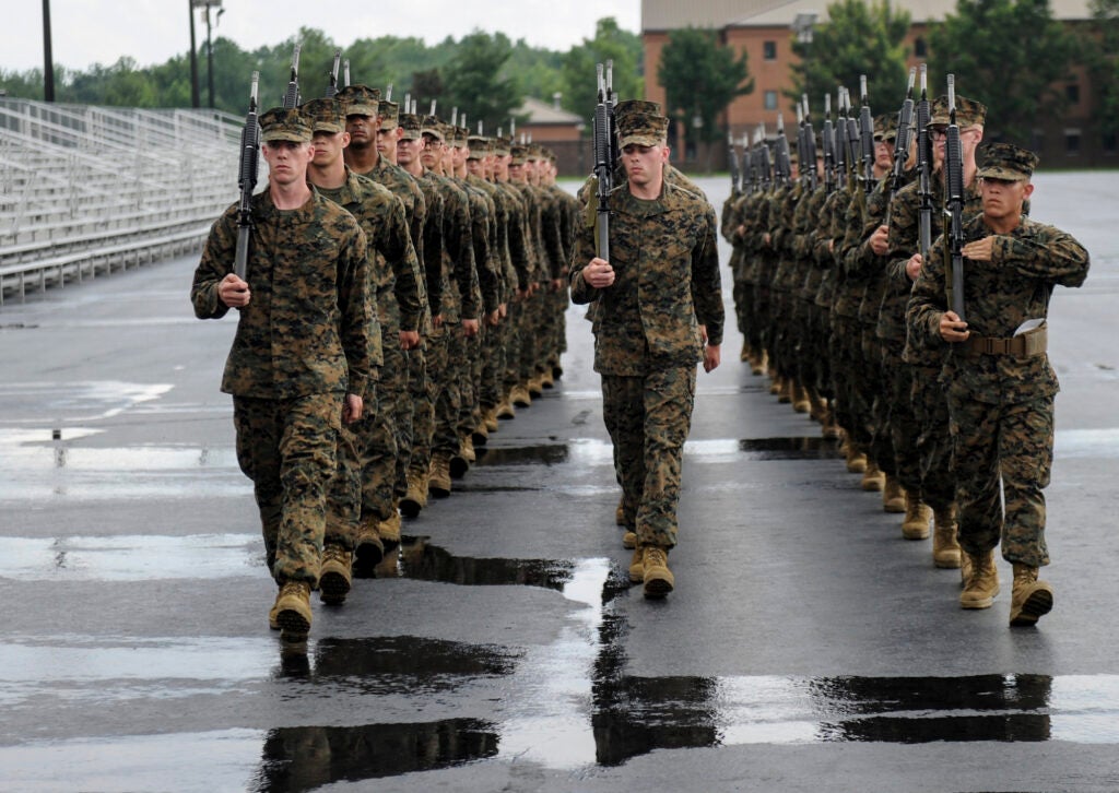 Candidates of Echo Company, U.S. Marine Corps Officer Candidate School are evaluated in close order drill at Officer Candidate School aboard Marine Corps Base Quantico, Va., June 27, 2013.  (Lance Cpl. Kathryn K. Bynum/U.S. Marine Corps)