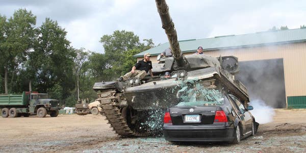 This Theme Park Lets You Drive A F**king Tank Through A House