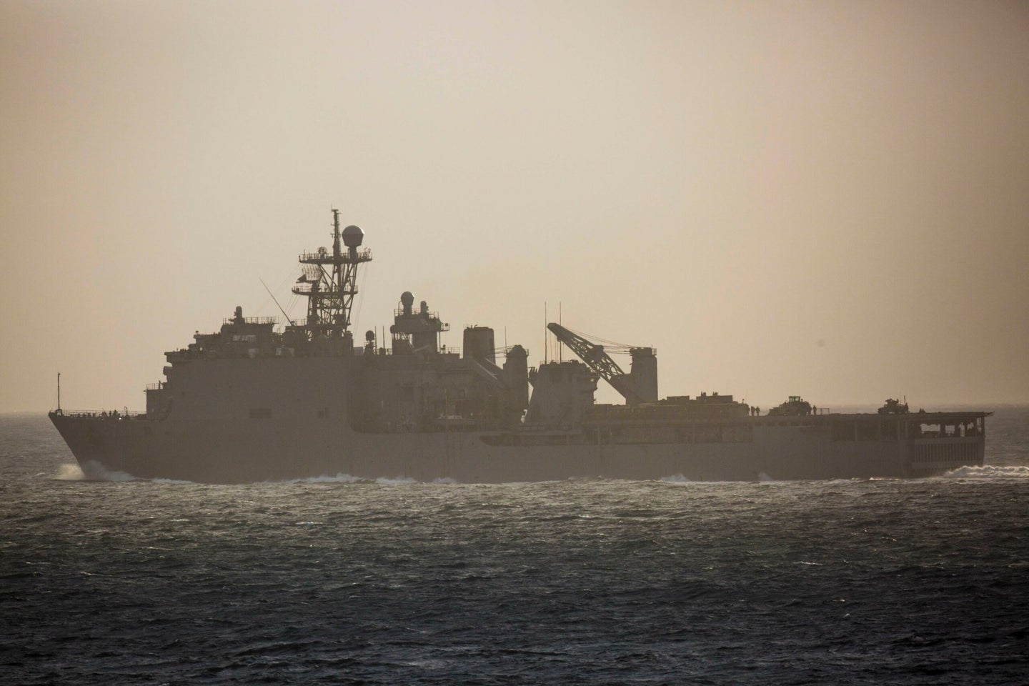 The Whidbey Island-class amphibious dock landing ship USS Rushmore (LSD 47) splits away from the Wasp-class amphibious ship USS Essex (LHD 2) while conducting a strait transit during Amphibious Ready Group (ARG), Marine Expeditionary Unit (MEU) Exercise (ARGMEUEX), April 30, 2018. ARGMEUEX provides essential and realistic ship-to-shore training, designed to enhance the integration of the Navy-Marine Corps team. Additionally, ARGMEUEX provides an opportunity to integrate unique individual and unit skills and develop the Essex ARG and 13th MEU’s collective proficiency in challenging and unfamiliar environments. (U.S. Marine Corps Photo by Cpl. Francisco J. Diaz Jr.)