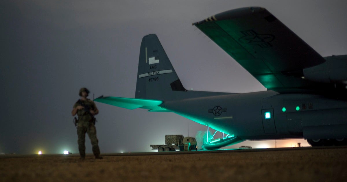 A U.S. Army soldier assigned to the 1-186th Infantry Battalion, Site Security Team, Task Force Guardian, Combined Joint Task Force – Horn of Africa (CJTF-HOA), provides security for a C-130J Super Hercules from the 75th Expeditionary Airlift Squadron (EAS) in Somalia, July 12, 2020. Task Force Guardian provides base security and force protection for CJTF-HOA personnel and U.S. partner forces deployed in the region. (U.S. Air Force photo by Staff Sgt. Shawn White)