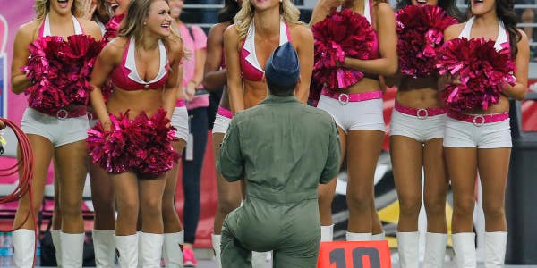 An Air Force Fighter Pilot Proposed To His NFL Cheerleader Girlfriend On The Sideline Of A Game