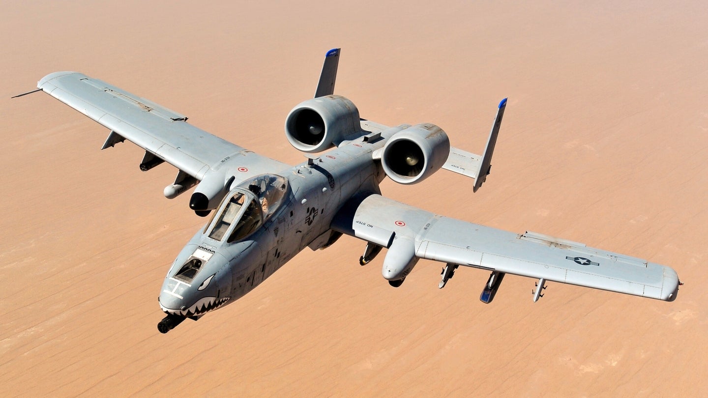 An A-10 Thunderbolt II, assigned to the 74th Fighter Squadron, Moody Air Force Base, GA, returns to mission after receiving fuel from a KC-135 Stratotanker, 340th Expeditionary Air Refueling Squadron, over the skies of Afghanistan in support of Operation Enduring Freedom, May 8, 2011. 