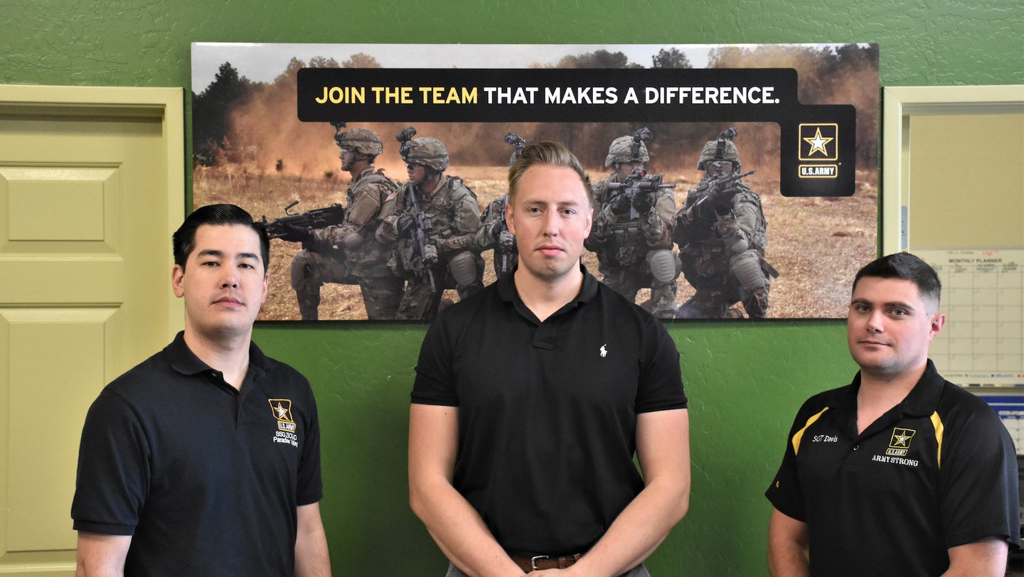 Staff Sgt. Zachary Ziolko (left), Staff Sgt. Nathan Kimberly (center) and Sgt. 1st Class Kyle Davis (right), recruiters for Paradise Valley Recruiting Station, Phoenix North Recruiting Company, Phoenix Recruiting Battalion, pose for a photo at their station headquarters, Phoenix, Dec. 4. All three were involved in rescue efforts, following a car crash outside their station, Nov. 9. Also assisting with the crash was Staff Sgt. Andrei Priimak (not pictured), who was the first recruiter to react to the accident and mobilize rescue efforts. (U.S. Army Photo by Alun Thomas, USAREC Public Affairs)