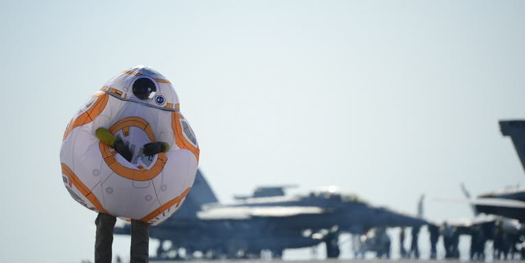 We salute the sailor who walked the flight deck in a Star Wars droid costume