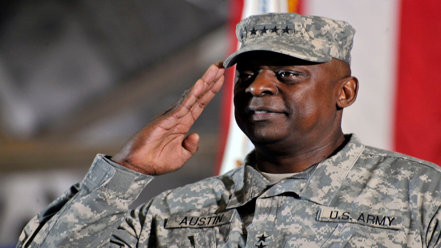 Gen. Lloyd J. Austin, III salutes during the playing of the national anthem after returning the United States Forces - Iraq colors to the U.S., Dec 20, 2011 at Joint Base Andrews, Md. The Ceremony marks the end of the 2nd longest war in U.S. History. (U.S. Air Force Photo by Senior Airman Perry Aston) (Released)