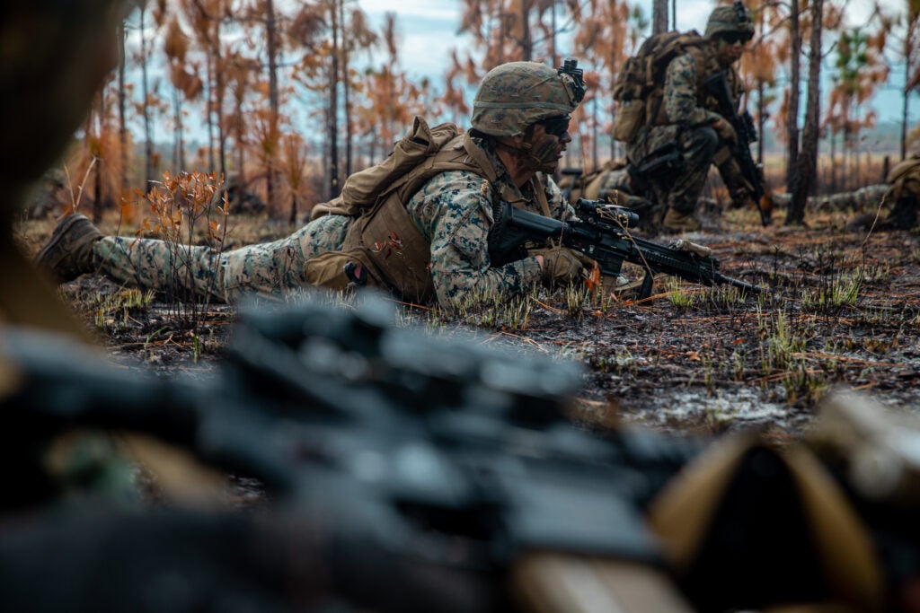 U.S. Marines with India Company, 3rd Battalion, 6th Marine Regiment, 2d Marine Division, buddy rush during live-fire assaults on range Golf-36 (G-36), Camp Lejeune, North Carolina, Dec. 12, 2020. Range G-36 is the newest addition to the Camp Lejeune training environment. This range is designed to accommodate company-size assaults and evolutions. (U.S. Marine Corps photo by Lance Cpl. Jacqueline Parsons)