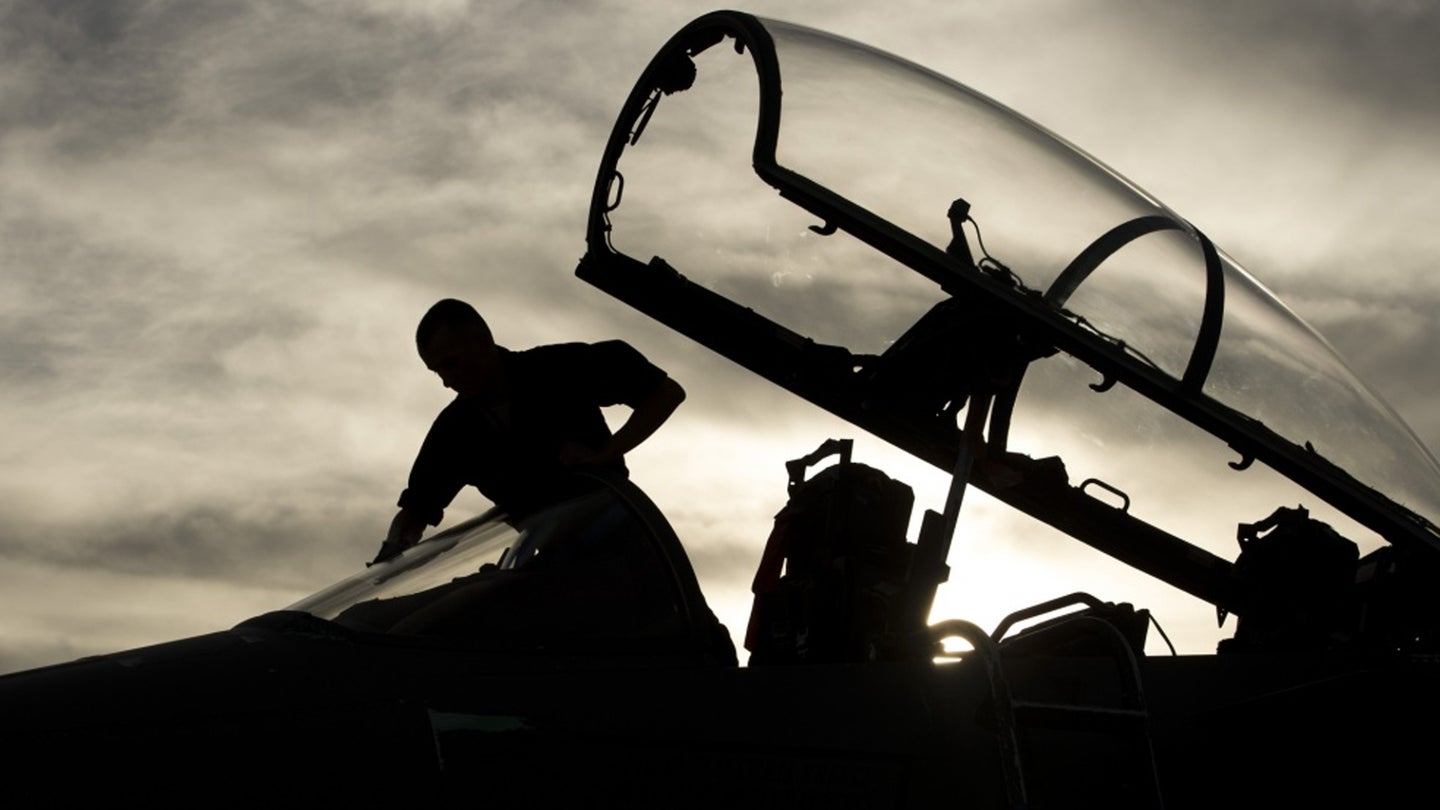Airman 1st Class Rene Martinez, 494th Fighter Wing, Royal Air Force, Lakenheath, England, prepares an F-15 Strike Eagle for takeoff during an air-to-ground Weapons System Evaluation Program (WSEP) at Hill AFB, Utah, Aug. 13, 2014 (Air Force photo / Airman 1st Class Taylor Queen)