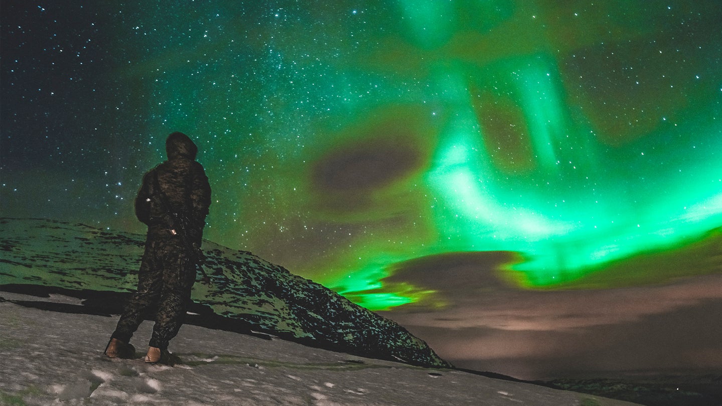 A Marine stands watch during a cold weather training event in Setermoen, Norway, Nov. 12, 2020, in preparation for Reindeer II, a bilateral exercise hosted by the Norwegian military to increase support capabilities between NATO allies in extreme conditions. (Marine Corps photo / Cpl. William Chockey)