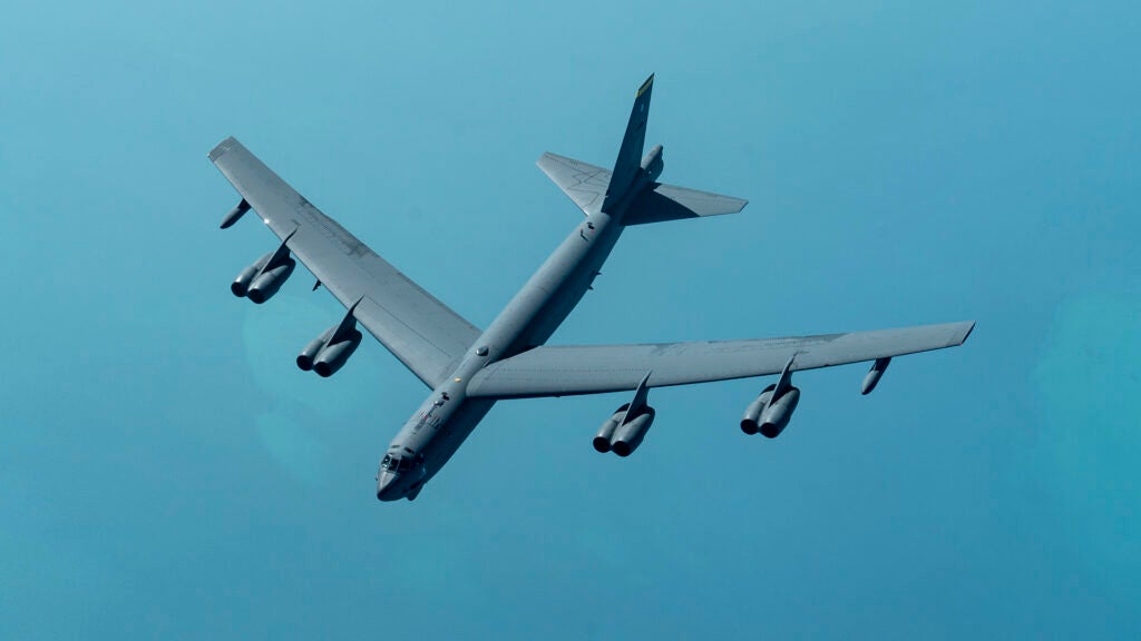 A U.S. Air Force B-52 Stratofortress from Minot Air Force Base, N.D. approaches a KC-135 Stratotanker before an aerial refueling mission over the U.S. Central Command area of responsibility Dec. 30, 2020. The deployment underscores the U.S. military's commitment to regional security and demonstrates a unique ability to rapidly deploy overwhelming combat power on short notice. The B-52 “Stratofortress” is a long-range, heavy bomber that is capable of flying at high subsonic speeds at altitudes of up to 50,000 feet and provides the United States with immediate nuclear and conventional global strike capability. (U.S. Air Force photo by Senior Airman Roslyn Ward)