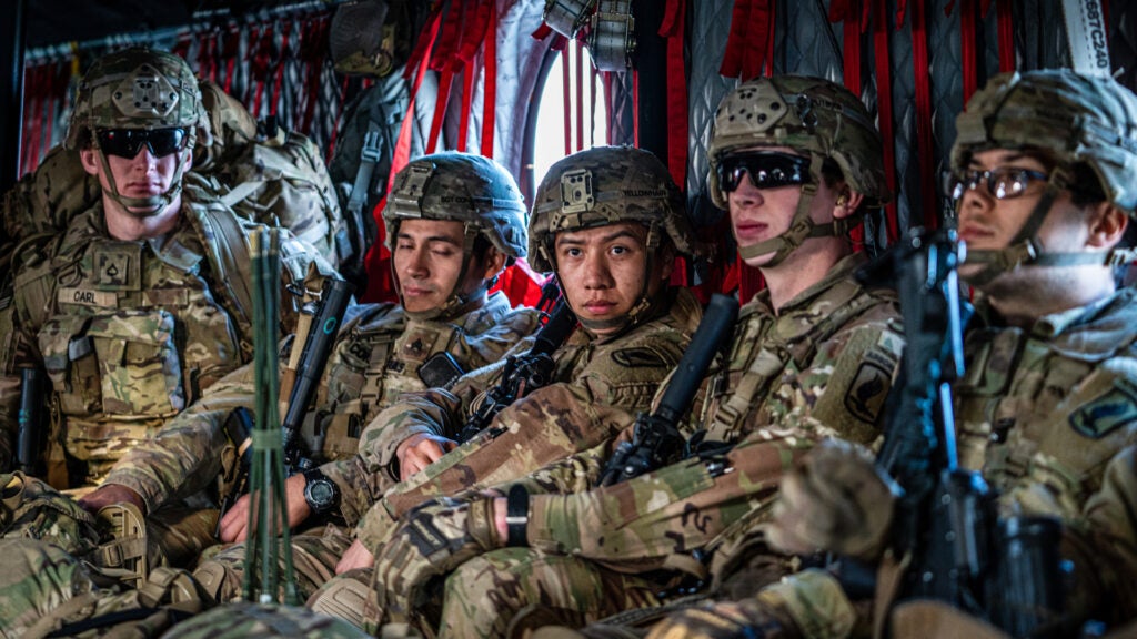 Paratroopers of the 173rd Airborne Brigade take a ride in a CH-47 Chinook from B Co, 1-214th General Support Aviation Battalion during air assault training in the Republic of Cyprus on Jan. 14, 2020