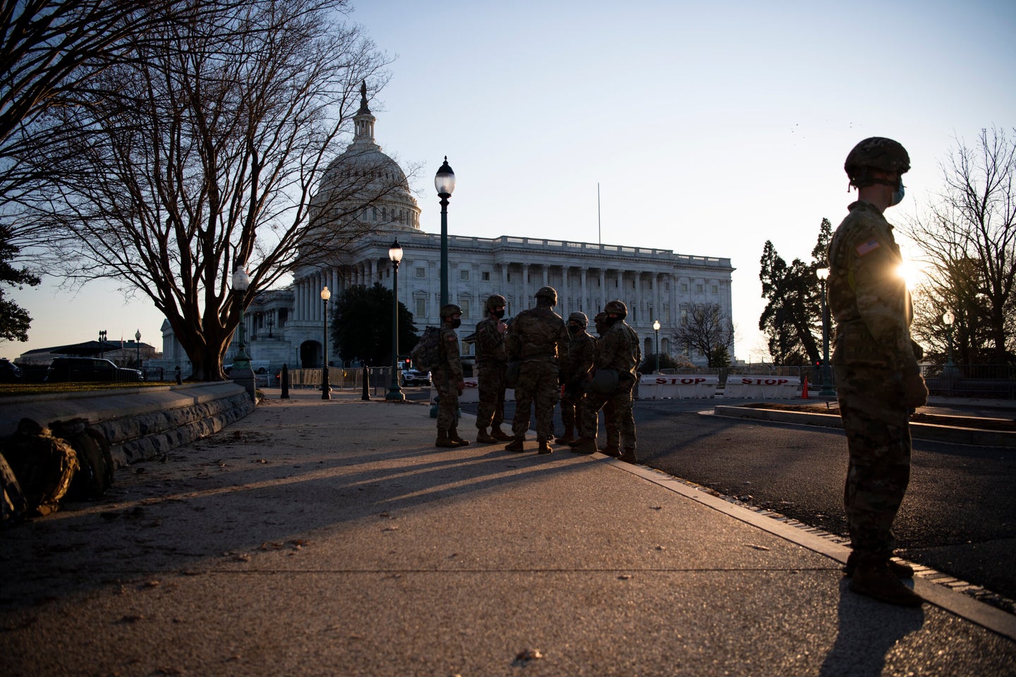 UNITED STATES - January 12: Members of the National Guard stand watch on the East Front of the Capitol in Washington on Tuesday, Jan. 12, 2021. (Photo by Caroline Brehman/CQ Roll Call via AP Images)