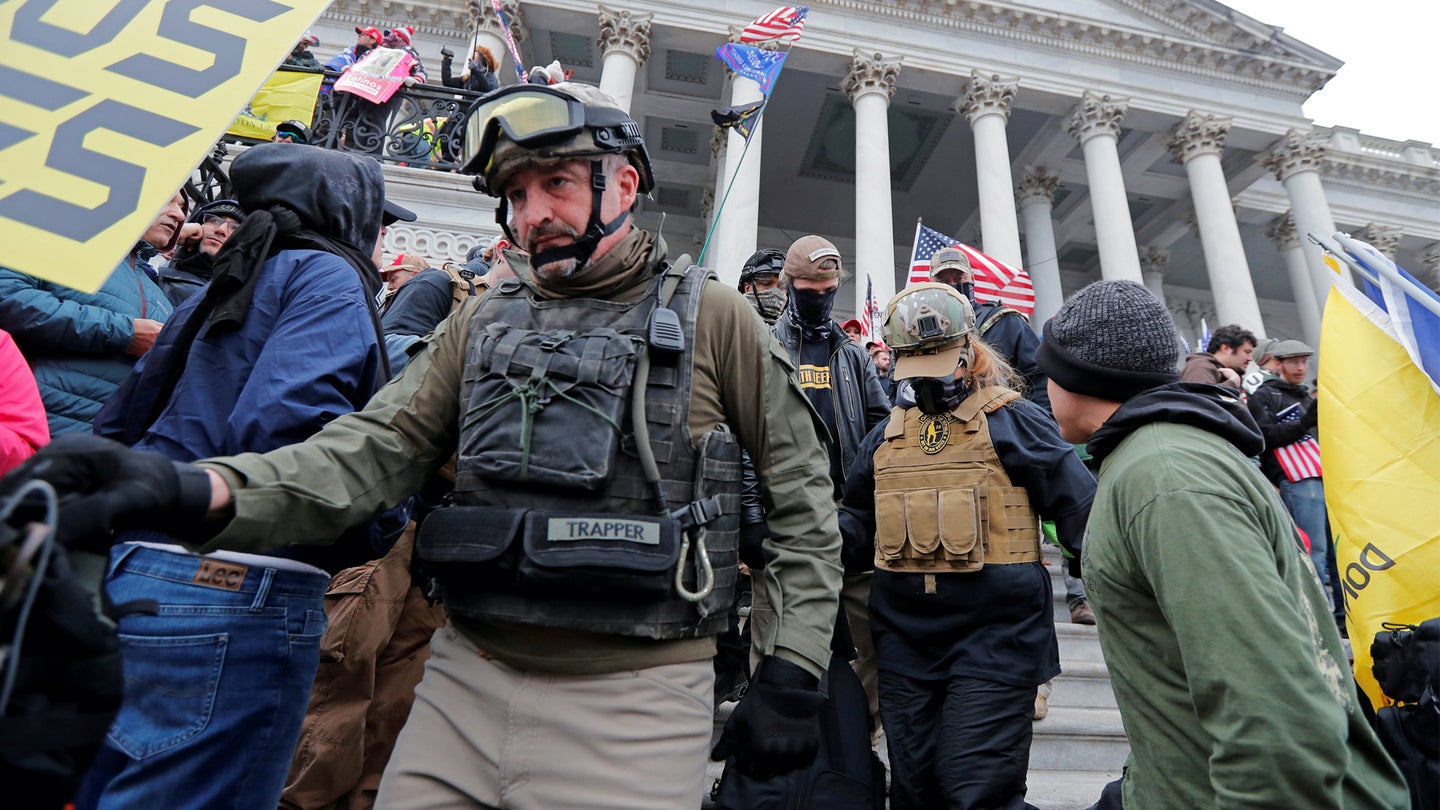 Members of the Oath Keepers, including Marine veteran, Donovan Crowl (foreground, wearing helmet and goggles) are seen among supporters of U.S. President Donald Trump at the U.S. Capitol during a protest against the certification of the 2020 U.S. presidential election results by the U.S. Congress, in Washington, U.S., January 6, 2021. (REUTERS/Jim Bourg)