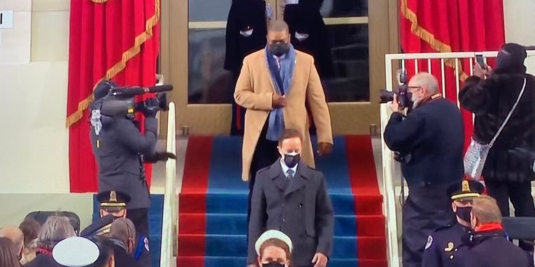 Army vet, Capitol officer who held off mob escorts Harris at inauguration
