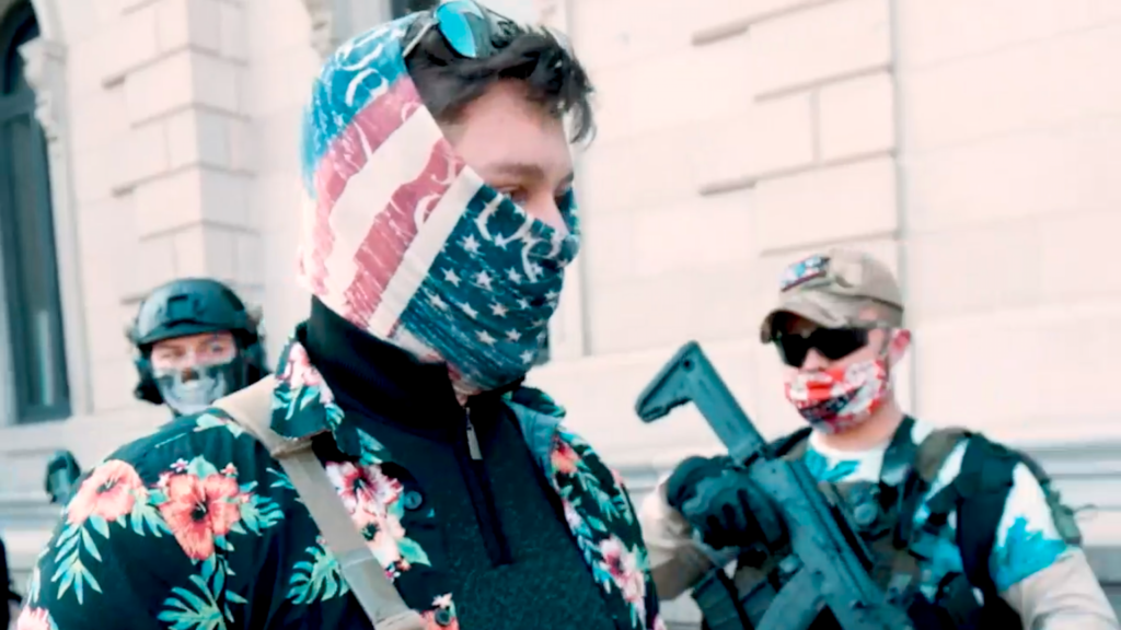 Mike Dunn, leader of the Last Sons of Liberty, a faction of the Boogaloo Bois, with members of the group on Nov. 21, 2020, in Richmond, Virginia. (FRONTLINE)