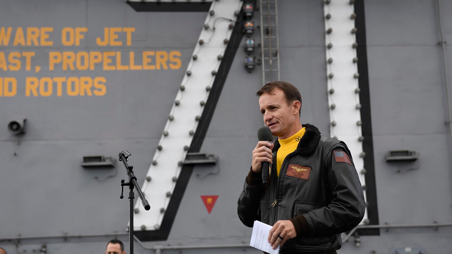 Capt. Brett Crozier, commanding officer of the aircraft carrier USS Theodore Roosevelt (CVN 71), addresses the crew during an all-hands call on the ship’s flight deck. Theodore Roosevelt is conducting routine operations in the Eastern Pacific Ocean. (U.S. Navy photo by Mass Communication Specialist 3rd Class Nicholas Huynh)