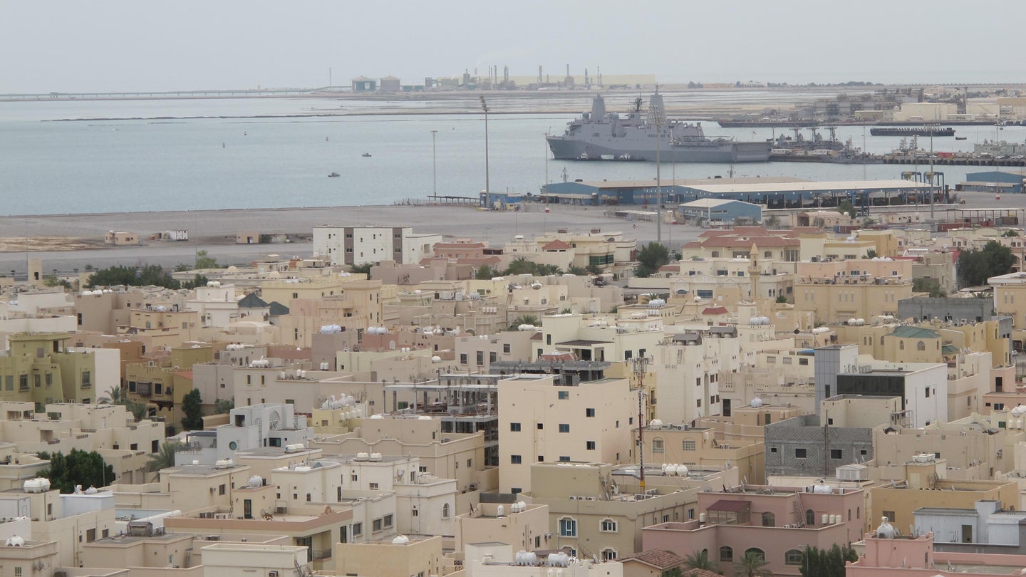 The amphibious transport dock ship USS Mesa Verde is pierside for her first port visit to Bahrain. Mesa Verde is on her maiden deployment as part of the Nassau Amphibious Ready Group supporting maritime security operations and theater security cooperation operations in the U.S. 5th Fleet area of responsibility. (U.S. Navy photo by Petty Officer 1st Class Steve Smith)