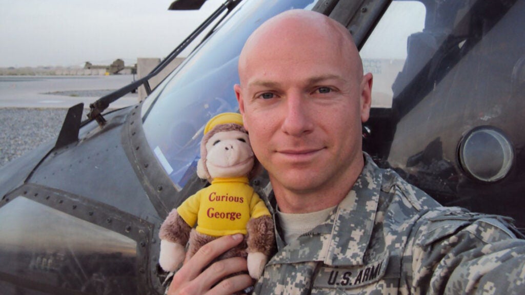 Curious George became a part of Davis’ team, to the point where he was even kidnapped as part of a joke by another aircrew after Davis accidentally left him in the aircraft. (Courtesy photo / Col. Jason Davis)