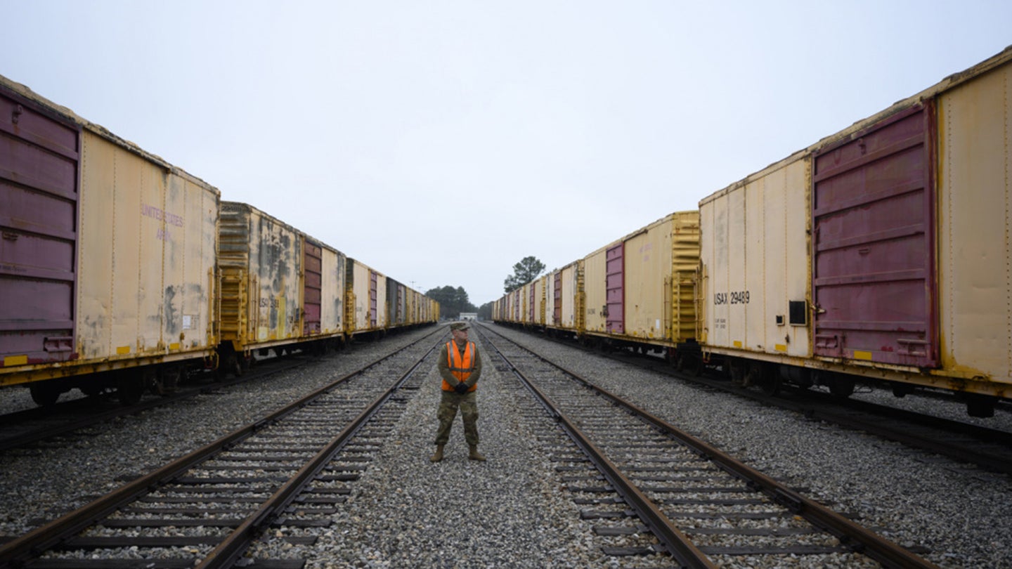 U.S. Army Sgt. Tyler Arant, 757th Expeditionary Railway Center student, poses for a photo at a rail yard at Joint Base Langley-Eustis, Virginia, March 17, 2021. (Air Force photo / Staff Sgt. Joshua Magbanua)