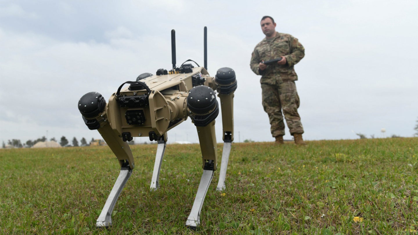 U.S. Air Force Master Sgt. Krystoffer Miller, 325th Security Forces Squadron operations support superintendent, operates a Quad-legged Unmanned Ground Vehicle at Tyndall Air Force Base, Florida, March 24, 2021. The purpose of the Q-UGV is to add an extra level of protection to base. (U.S. Air Force photo by Airman 1st Class Anabel Del Valle)