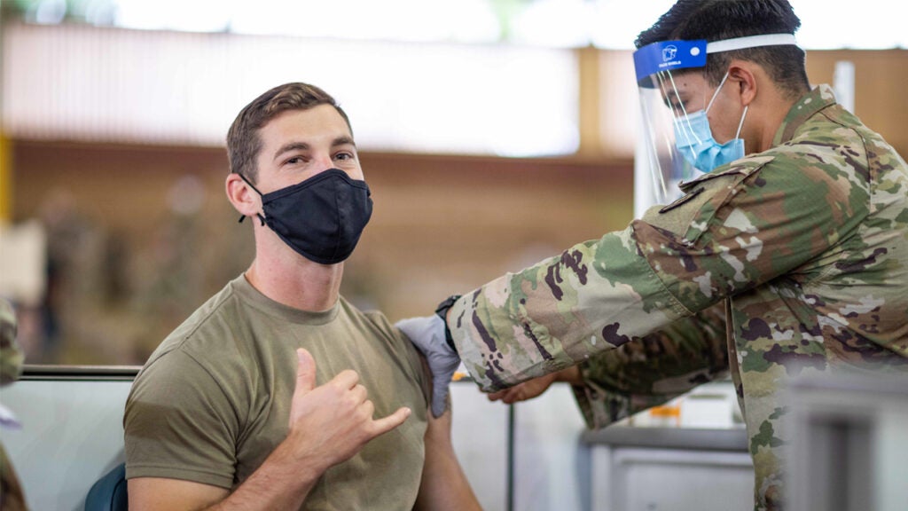 A soldier at Schofield Barracks, Hawaii, receives the COVID-19 vaccine, Jan. 14, 2021.