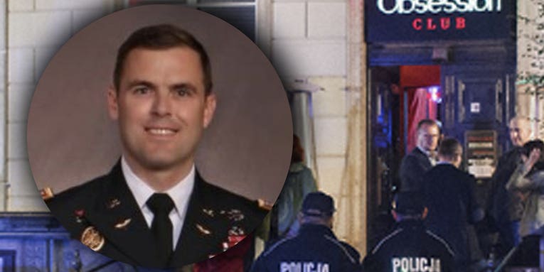 An Army major was allegedly drugged and bitten by strippers during a drunken escapade in Poland