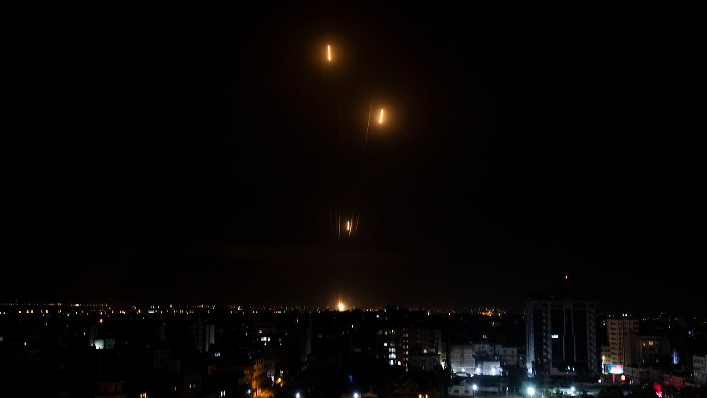 Rockets are launched from the Gaza Strip towards Israel, Tuesday, May. 11, 2021.  The barrage of rockets from the Gaza Strip and airstrikes into the territory continued almost nonstop throughout the day, in what appeared to be some of the most intense fighting between Israel and Hamas since their 2014 war.(AP Photo/Khalil Hamra)