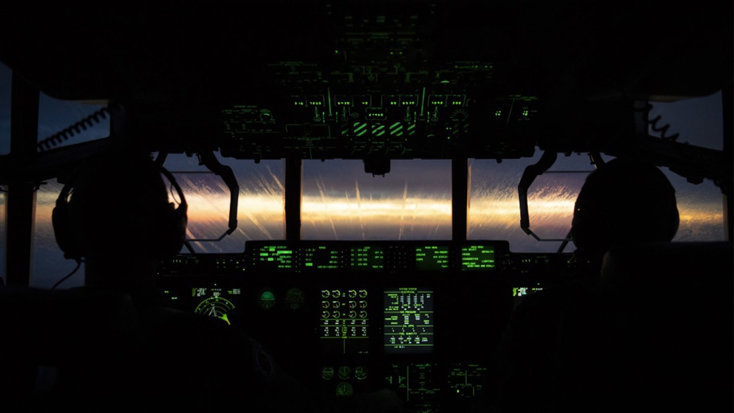 The sun is setting as the crew of the Hurricane Hunters catch a slight break in the storm, September 13, 2018. The U.S. Air Force Reserve 53rd Weather Reconnaissance Squadron, or Hurricane Hunters, is conducting a storm tasking mission into Hurricane Florence using a WC-130J Hercules, currently a category 2 storm. (Air Force Photo by Technical Sgt. Chris Hibben)