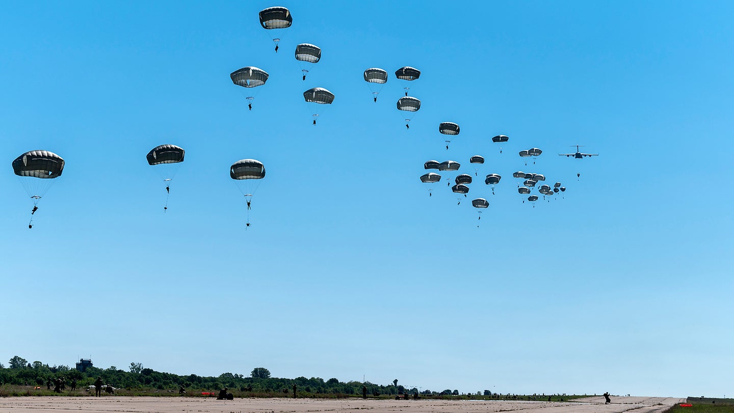 Soldiers with the 173rd Airborne Brigade parachute May 11, 2021, from an Air Force C-17 Globemaster III during Swift Response 21 at Cheshnegirovo Air Base, Bulgaria. More than 7,000 paratroopers from the U.S. and nine other nations conducted a series of joint forcible entry exercises in Estonia, Bulgaria and Romania over a two-week span. (U.S. Air Force photo by Master Sgt. David W. Carbajal)
