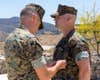 Lt. Col. Matthew T. Ritchie, the commanding officer of 1st Battalion (1st Bn.), 11th Marines, 1st Marine Division, decorates Petty Officer 2nd Class Joseph Hardebeck, a corpsman with Battery A., 1st Bn., 11th Marines, with the Purple Heart Medal, at Marine Corps Base Camp Pendleton, California, July 1, 2021. Hardebeck was awarded the Purple Heart Medal for his injuries sustained in support of Operation Enduring Freedom. (U.S. Marine Corps photo by Staff Sgt. Connor Hancock)
