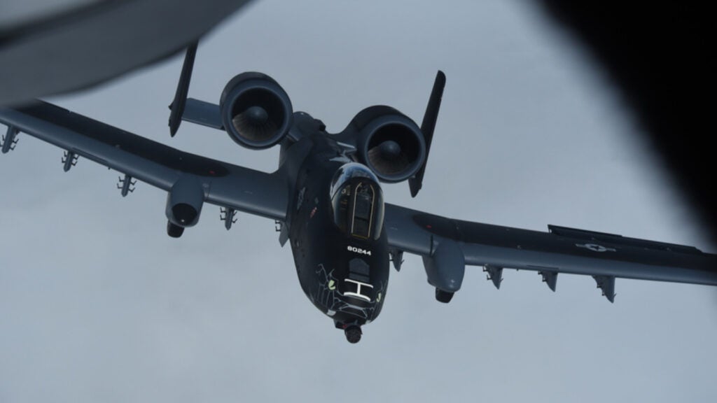 A black and grey U.S. Air Force A-10 Thunderbolt II from the Indiana Air National Guard’s 122nd Fighter Wing “Blacksnakes,” flying home on July 7, 2021. (U.S. Air National Guard photo: Senior Master Sgt. Vincent De Groot)