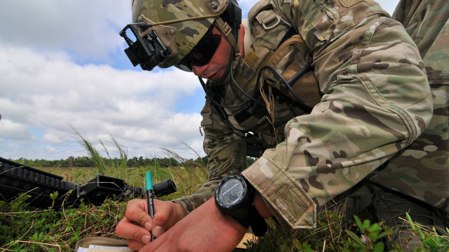U.S. Air Force Airman 1st Class Joshua Darins fills out a simulated nine line medevac request during training at Warren Grove Gunnery Range in Ocean County, N.J. on Aug. 29. Darins is a tactical air control party airman assigned to the 227th Air Support Operations Squadron, 177th Fighter Wing, New Jersey Air National Guard. (U.S. Air National Guard photo by Master Sgt. Andrew J. Moseley/Released)
