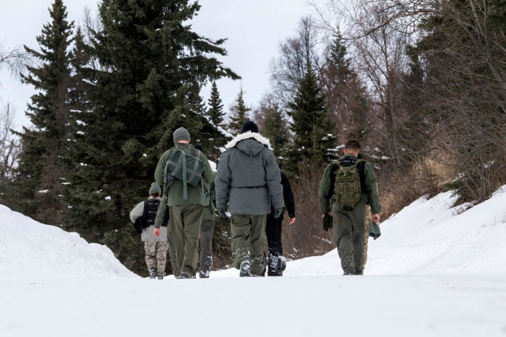 Combat Survival Training students finish a Survival, Evasion, Resistance and Escape course at Joint Base Elmendorf-Richardson, Alaska, March, 7, 2019. Combat Survival Training is the SERE refresher course for high-risk personnel to get reacquainted with some of the skills they learned during the extensive S-V-80A course at Fairchild Air Force Base in Spokane, Washington. (U.S. Air Force photo by Airman 1st Class Jonathan Valdes Montijo)