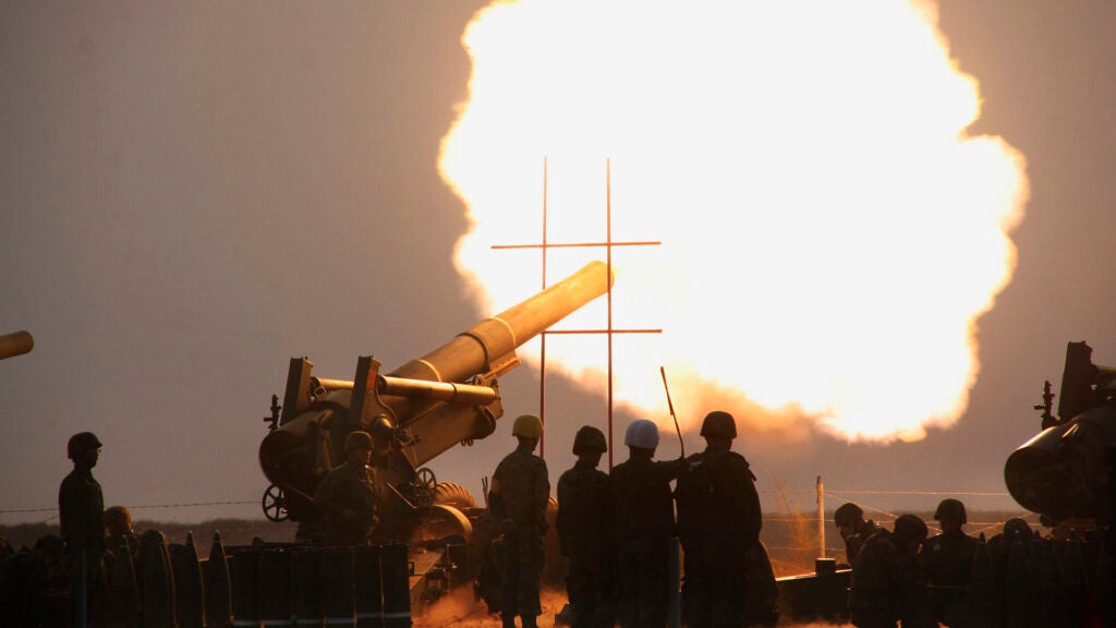 Taiwan's military fires an 8 inch Howitzer canon during a live fire exercise Wednesday, Oct. 29, 2008, on the Taiwan island of Kinmen, formerly Quemoy, just 2 kilometers (1.24 miles) off of the coast of China. (AP Photo)