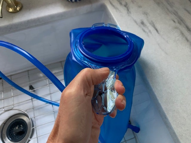 The handle on the water reservoir in the CamelBak M.U.L.E. Pro 14 hydration system