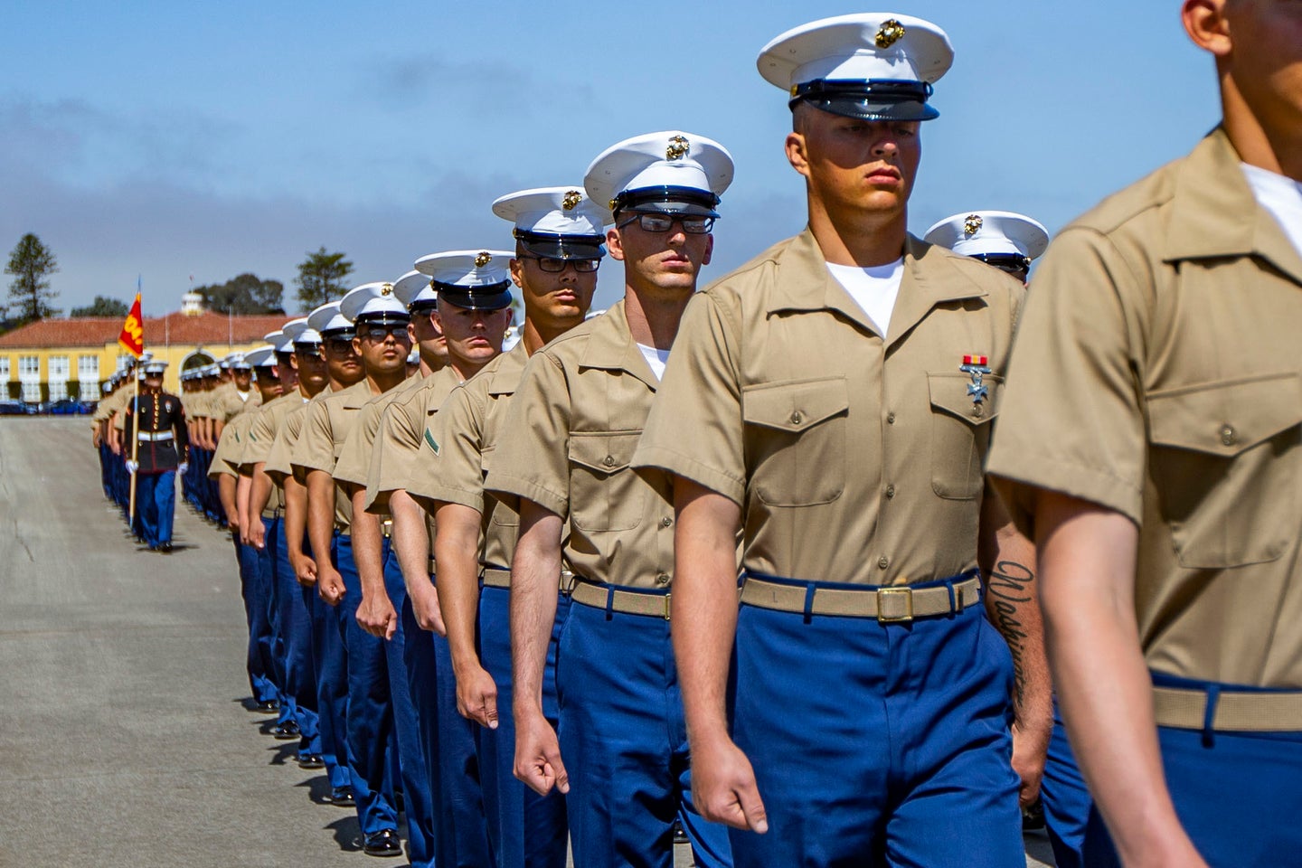 New U.S. Marines of Charlie Company, 1st Recruit Training Battalion, march in formation during a graduation ceremony at Marine Corps Recruit Depot, San Diego, July 30, 2021. Graduation took place at the completion of the 13-week transformation including training for drill, marksmanship, basic combat skills and Marines Corps customs and traditions. (U.S. Marine Corps photo by Lance Cpl. Grace J. Kindred)