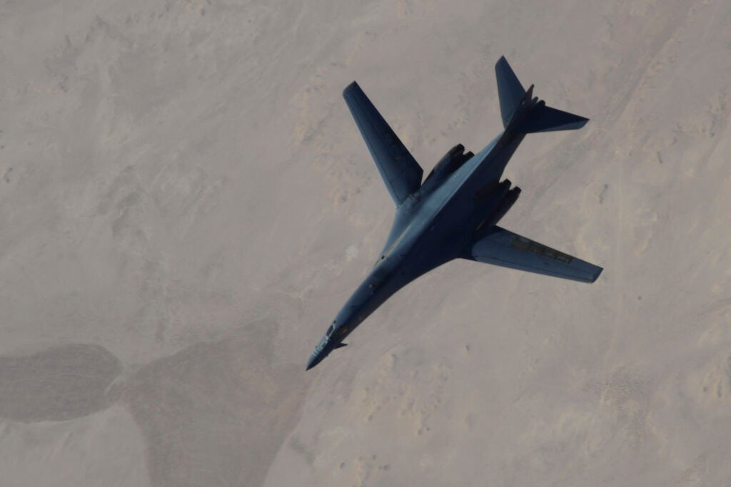 A B-1B Lancer disengages from a KC-135 Stratotanker after refueling Sept. 27, 2014. The B-1B Lancer was part of a large coalition strike package that was engaging ISIL targets in Syria. (U.S. Air Force photo by Staff Sgt. Ciara Wymbs)