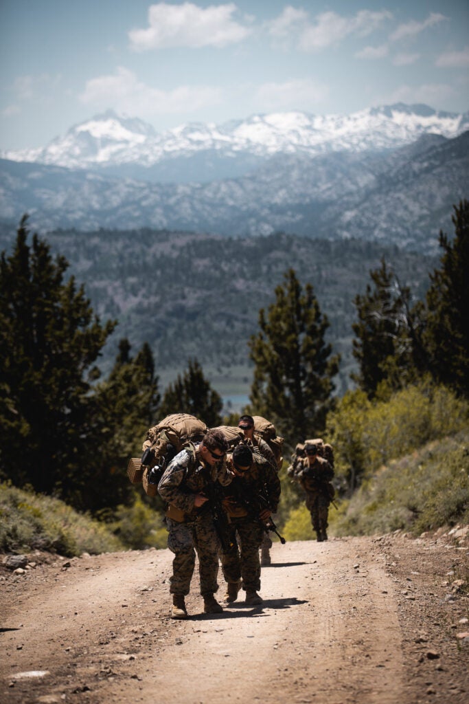 U.S. Marines with 3rd Battalion, 5th Marine Regiment, 1st Marine Division conduct an acclimation hike during Mountain Training Exercise (MTX) 5-20 at Marine Corps Mountain Warfare Training Center, Bridgeport, Calif., June 12, 2020. Marines participated in MTX to hone their combat and survival skills in an austere mountain environment. (U.S. Marine Corps photo by Lance Cpl. Cedar Barnes)