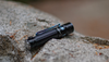 Detail of the two-way clip and overall form factor of the Olight Warrior Mini 2.