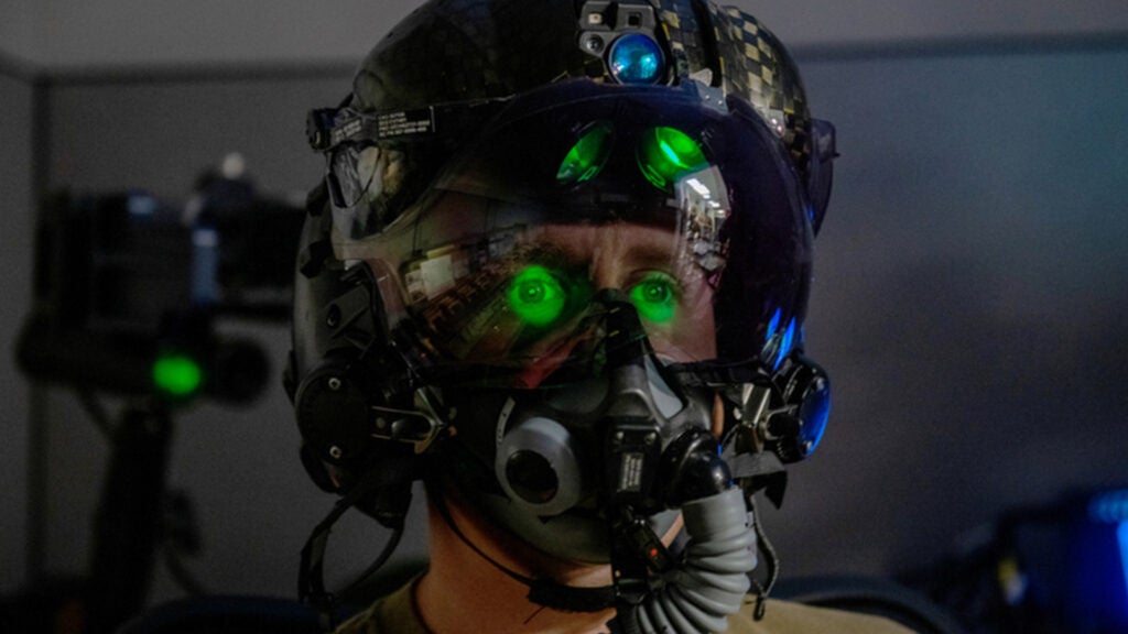 U.S. Air Force Tech. Sgt. Anthony Farnsworth, 419th Operations Support Squadron, poses for a photo to demonstrate the F-35 Generation III Helmet-Mounted Display at Hill Air Force Base, Utah, on July 10, 2021. (Senior Airman Erica Webster / U.S. Air Force)