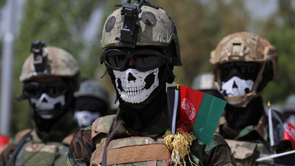 FILE - In this July 17, 2021 file photo, new Afghan Army Special Forces attend their graduation ceremony after a three-month training program at the Kabul Military Training Center, in Kabul, Afghanistan.  (Rahmat Gul/Associated Press)
