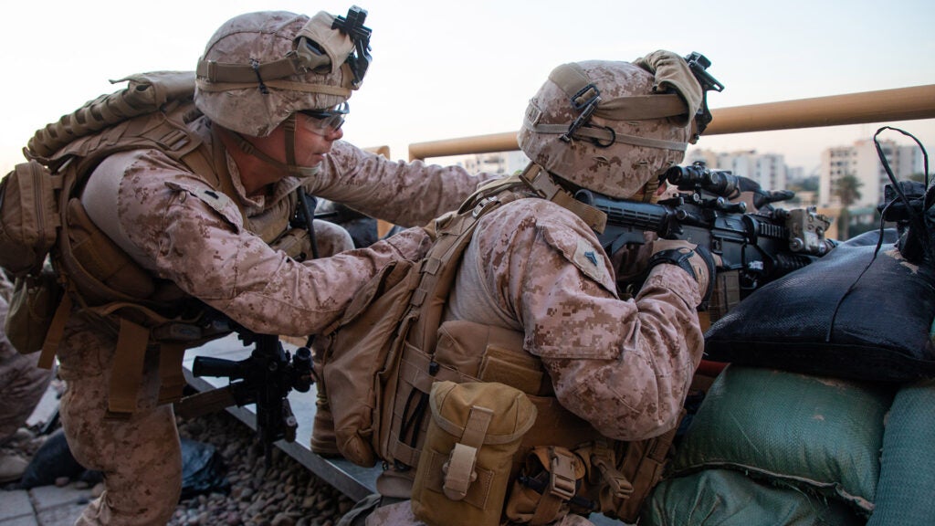 U.S. Marines with 2nd Battalion, 7th Marines, assigned to the Special Purpose Marine Air-Ground Task Force-Crisis Response-Central Command (SPMAGTF-CR-CC) 19.2, reinforce the Baghdad Embassy Compound in Iraq, Jan 1, 2020. The SPMAGTF-CR-CC is a quick reaction force, prepared to deploy a variety of capabilities across the region. (U.S. Marine Corps photo by Sgt. Kyle C. Talbot)