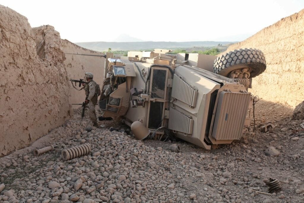 U.S. Marines from 1st Battalion 2nd Marine Regiment(1/2) in a Mine Resistent Ambush Protected Vehicle(MRAP) after hitting a Improvised Explosive Device during a convoy from PB Griffin to OP Habib, April 4, 2010. Marines with 1/2 participate in Combat Operations in Helmand Province in support of Operation Enduring Freedom. (U.S. Marine Corps photo by Lance Cpl. Carl Payne)