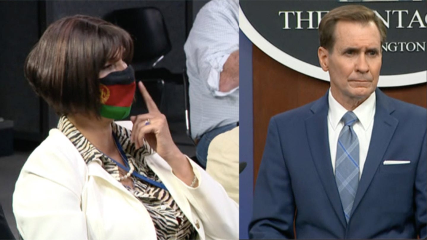 Afghan reporter Nazira Karimi points to her face mask of the flag of the former Islamic Republic of Afghanistan during a press briefing with Pentagon spokesman John Kirby on Aug. 16, 2020 (Screenshot via CNN)