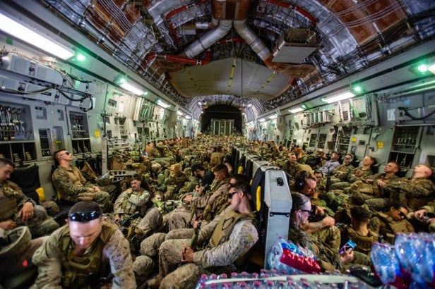 Marines assigned to the 24th Marine Expeditionary Unit (MEU) fly to Hamid Karzai International Airport, Kabul, Afghanistan, August 17. Marines are assisting the Department of State with an orderly drawdown of designated personnel in Afghanistan. (U.S. Marine Corps photo by 1st Lt. Mark Andries)
