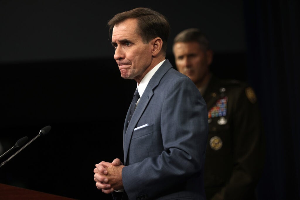 ARLINGTON, VIRGINIA - AUGUST 17:  U.S. Department of Defense Press Secretary John Kirby (L) speaks as Army Major General William Taylor (R) listens during a news briefing at the Pentagon August 17, 2021 in Arlington, Virginia. Kirby held a news briefing to discuss the current situation in Afghanistan after the Taliban took control of the capital city of Kabul. (Photo by Alex Wong/Getty Images)